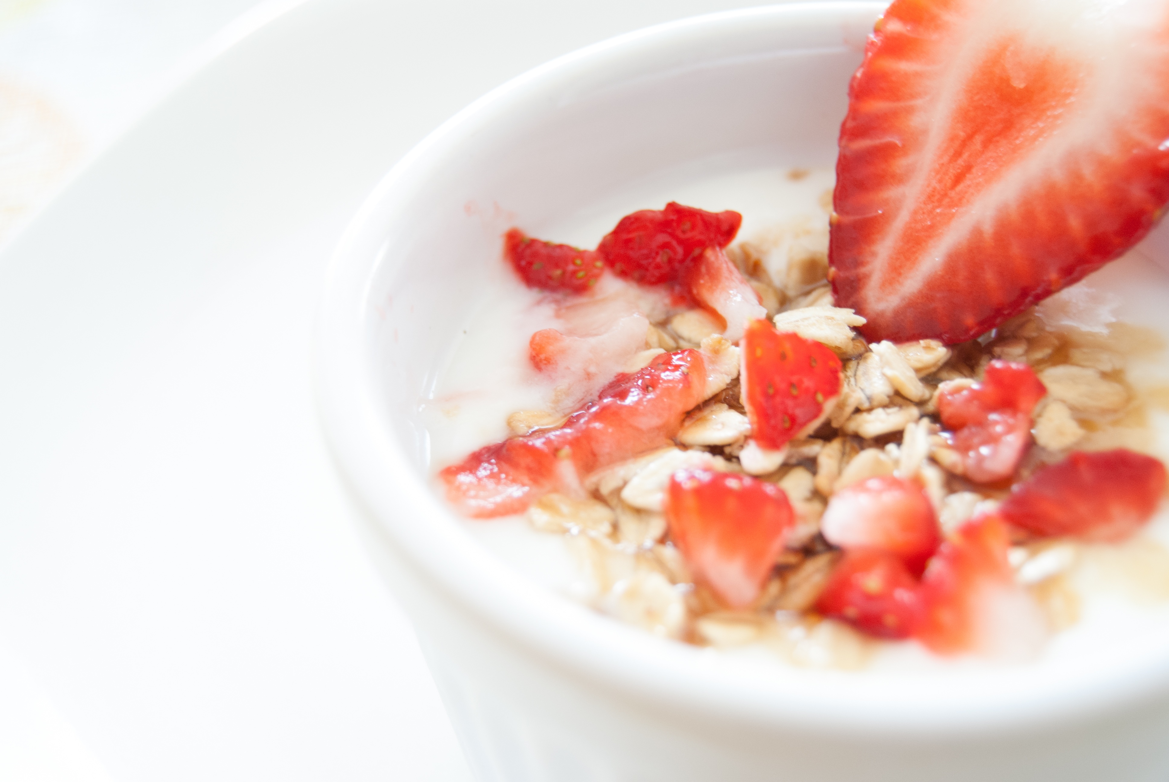 Bowl with strawberries and granola