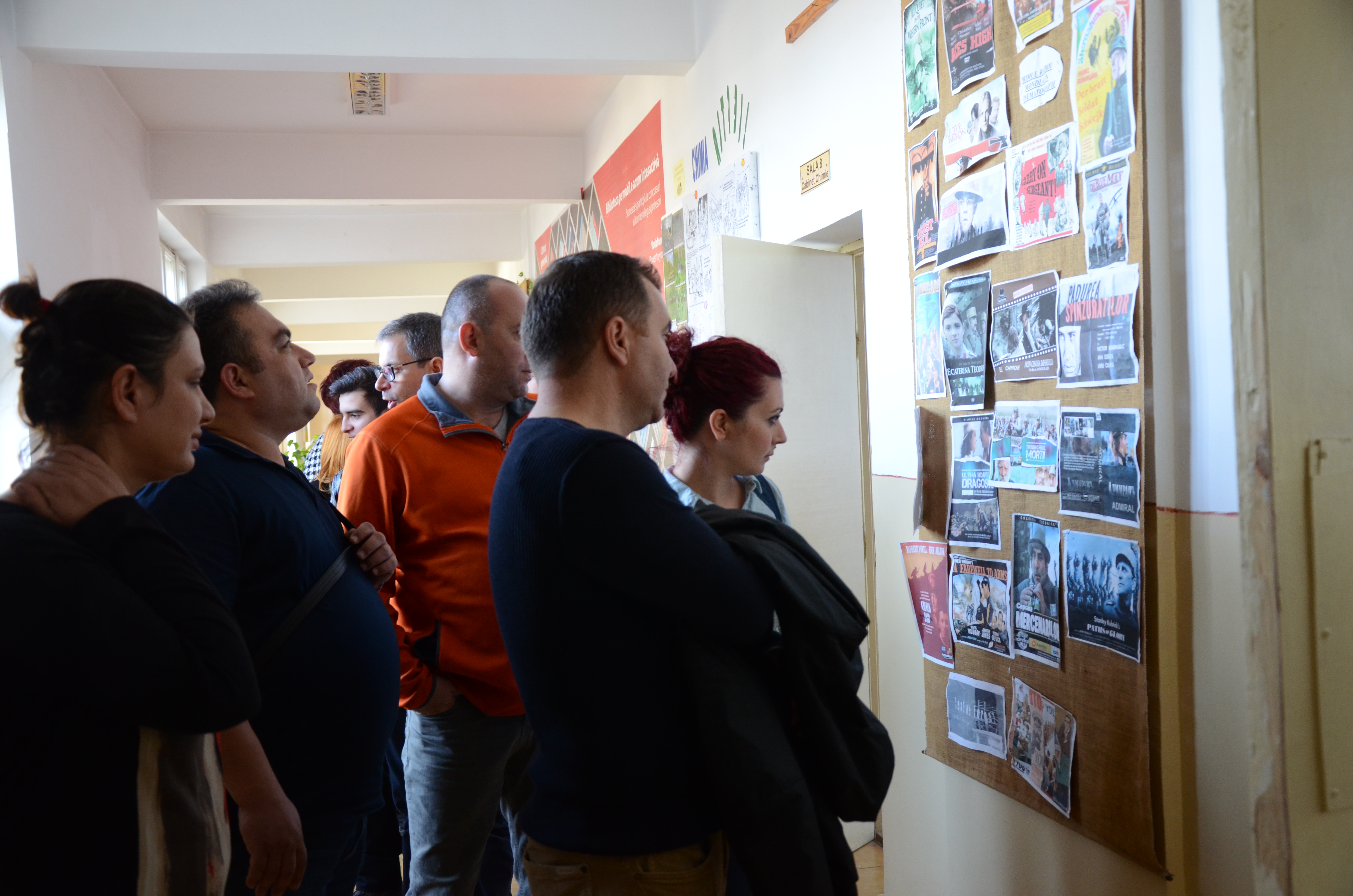 Partners looking at photo board