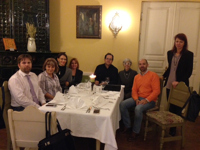 Group photo of partners during dinner