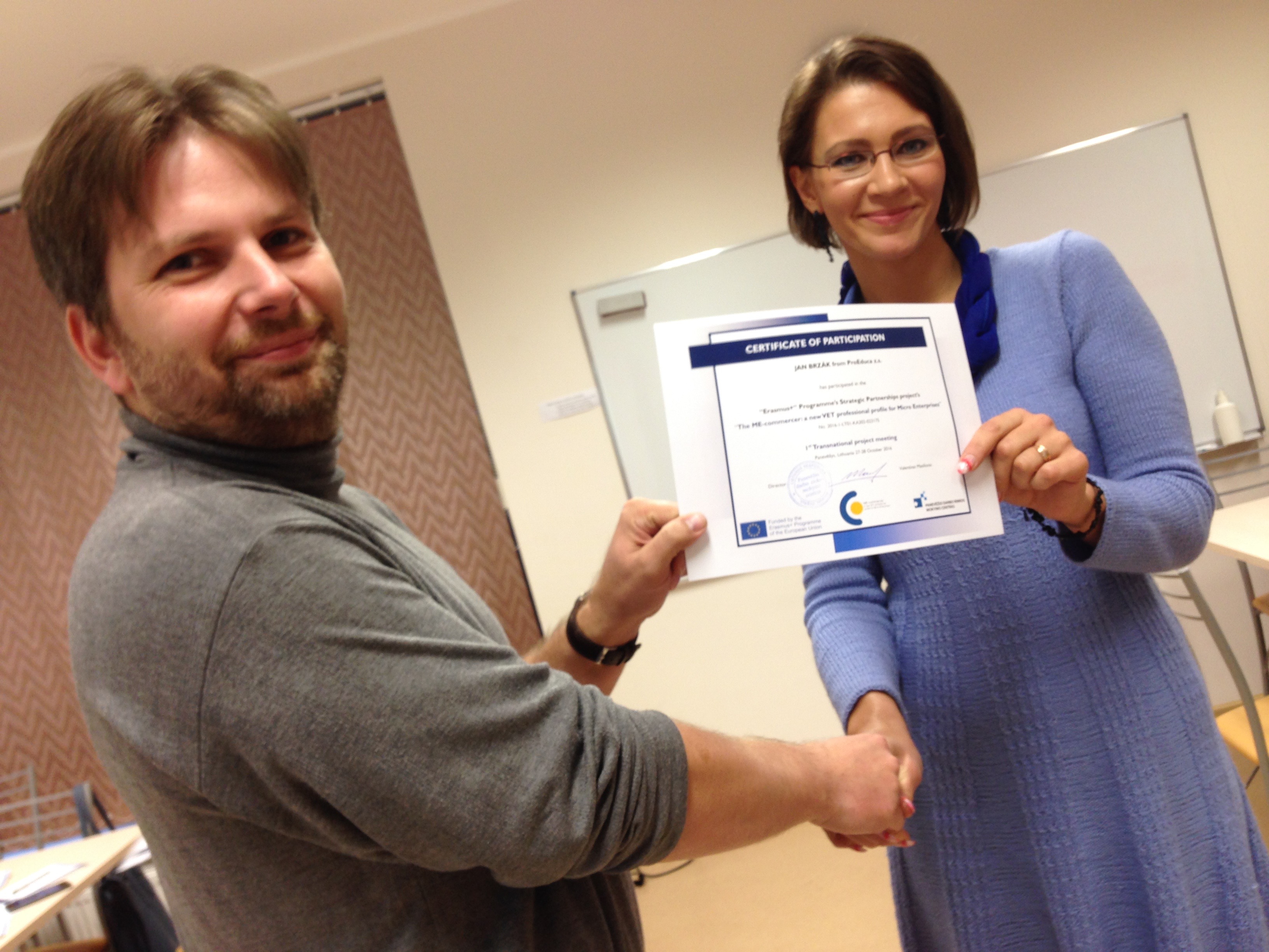 2 partners holding certificate