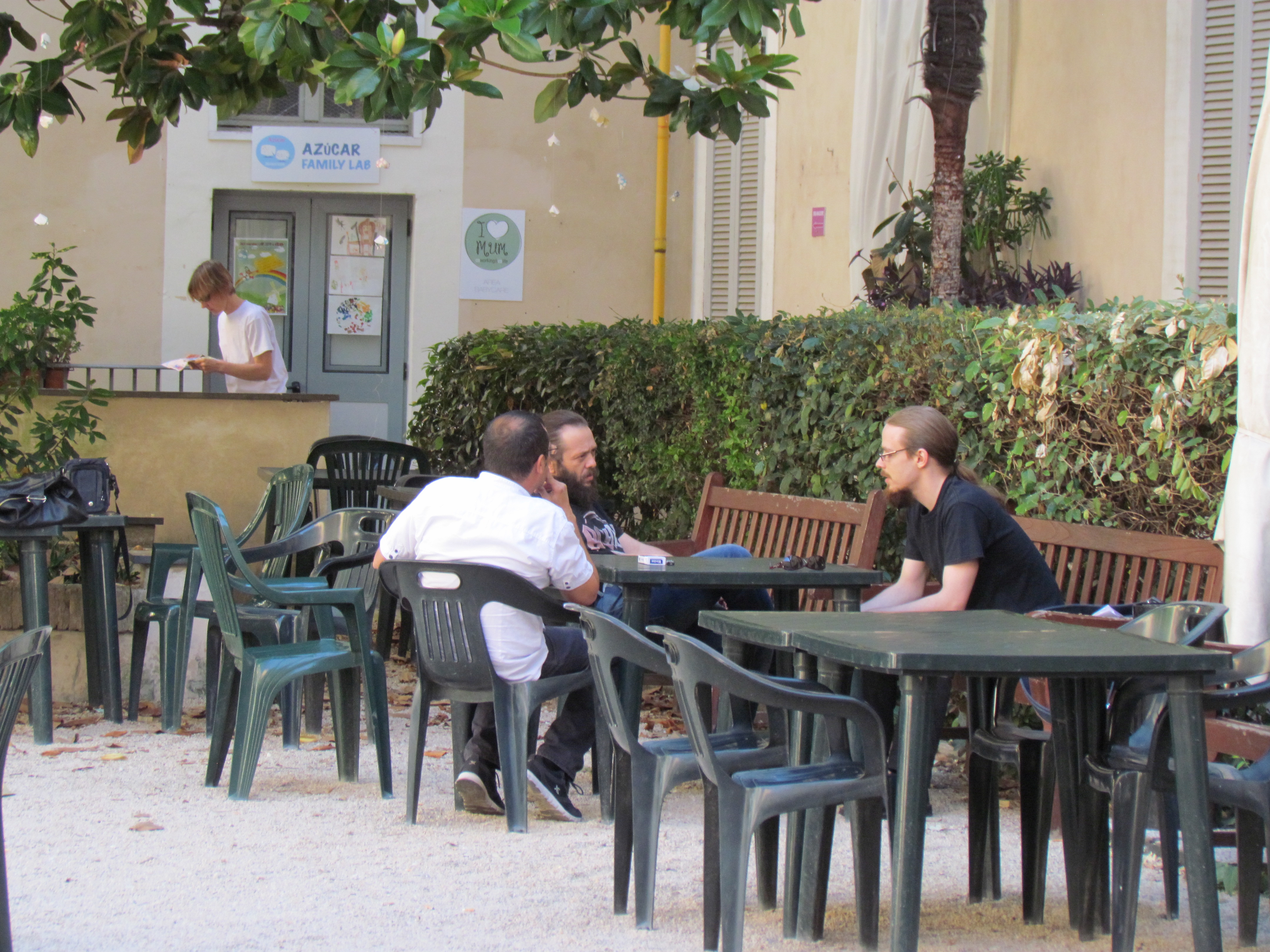 Partners talking in outdoor cafe