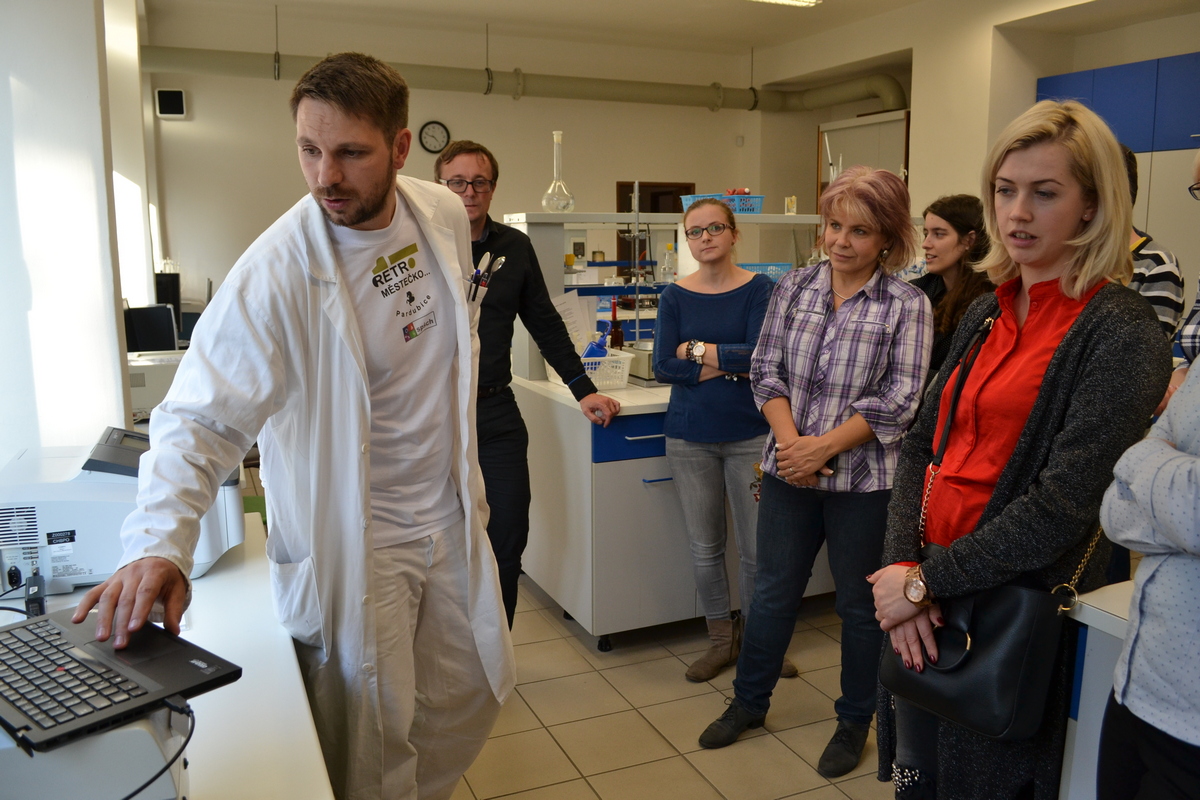 Partners being shown around laboratory