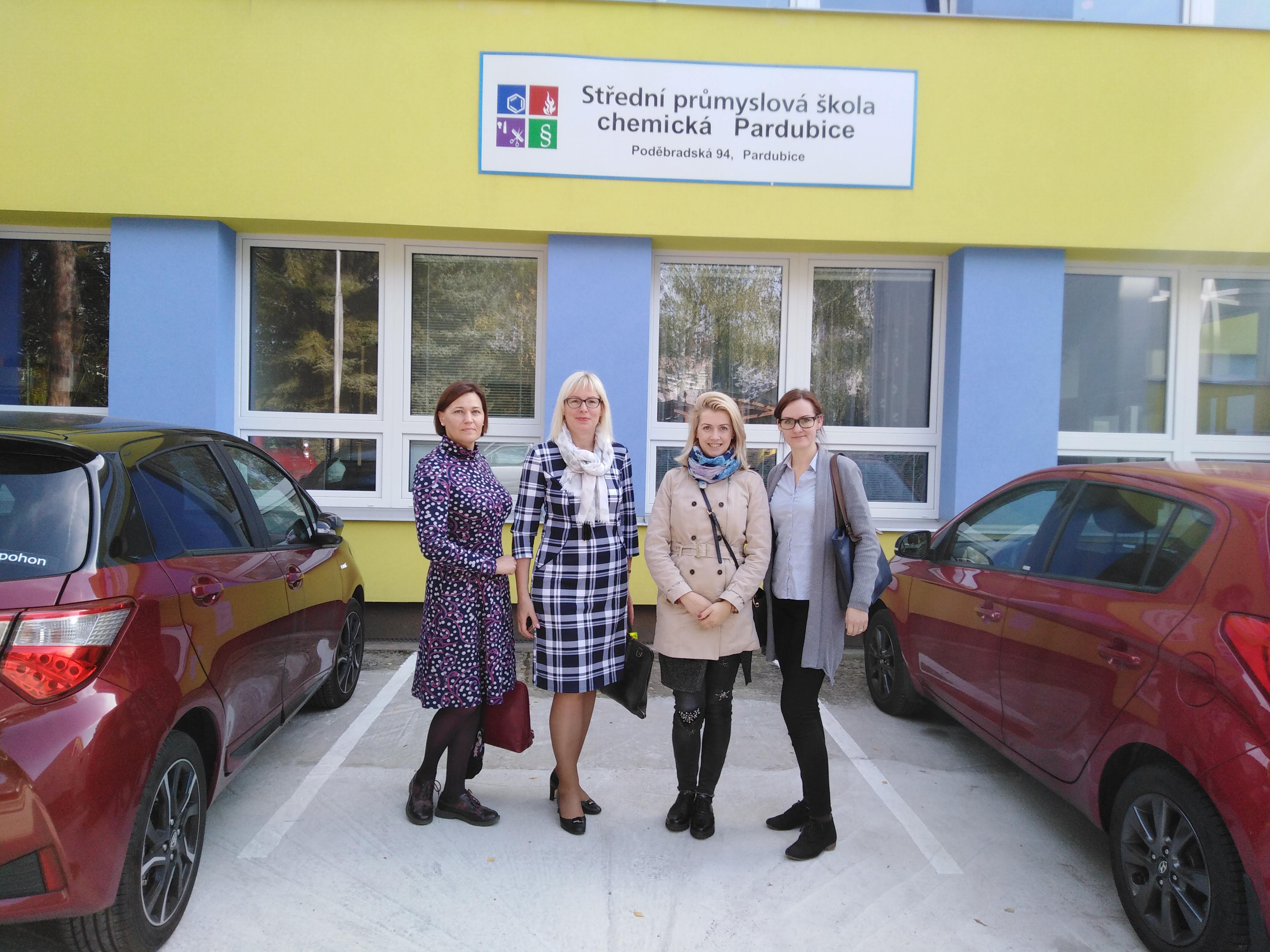 4 partners outside middle school in Pardubice