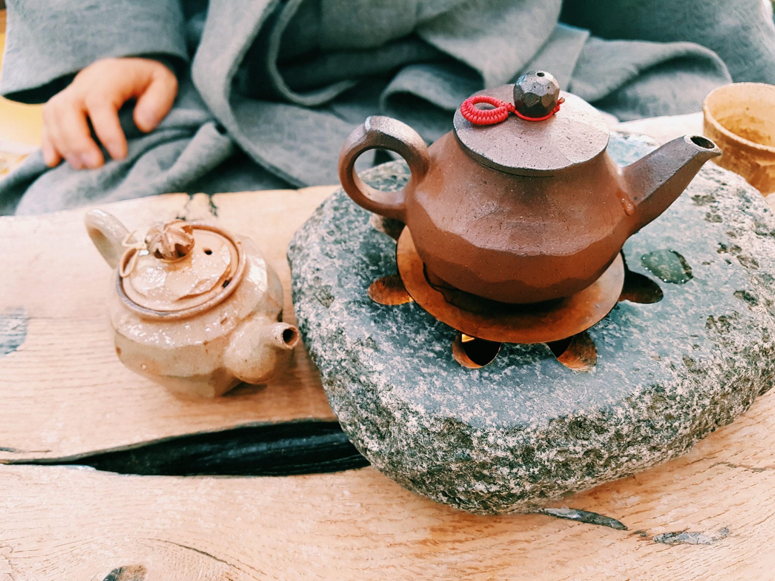 Two pots of tea on a table