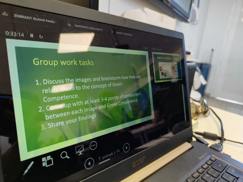 Laptop screen with group work task