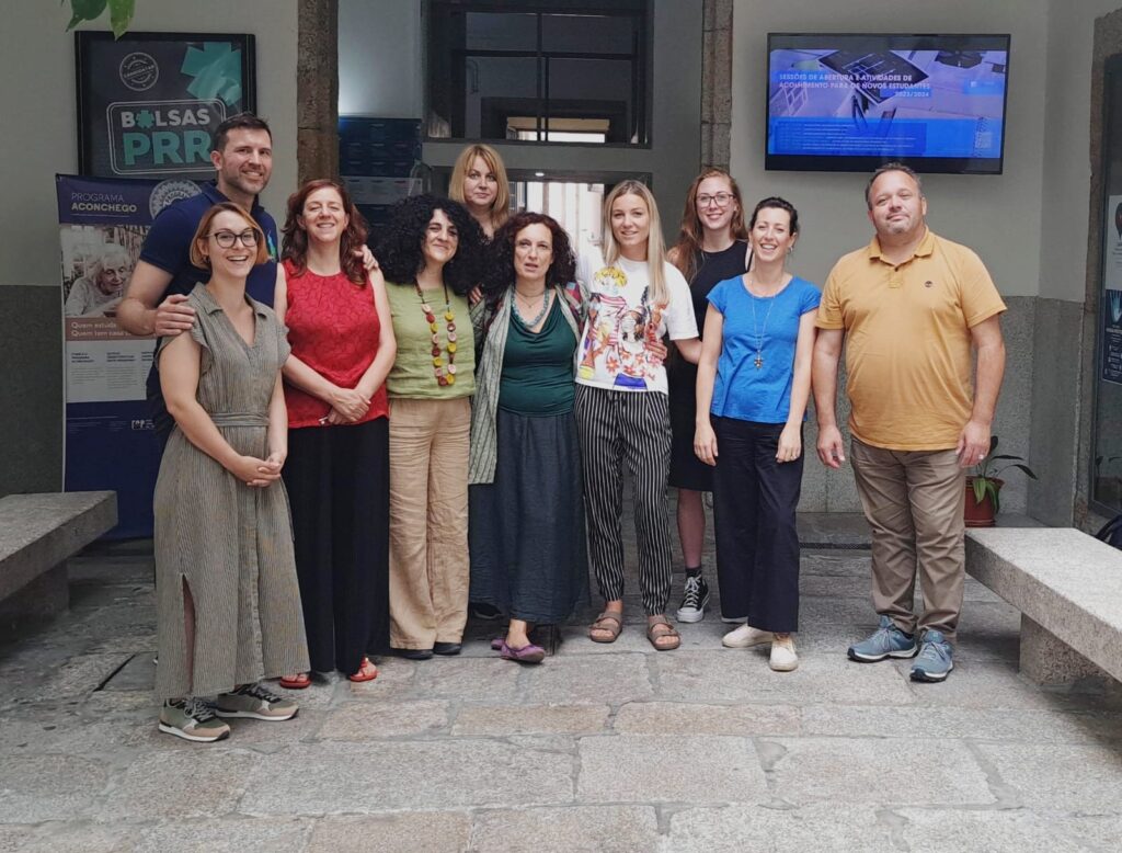 Group photo with partners in the university courtyard