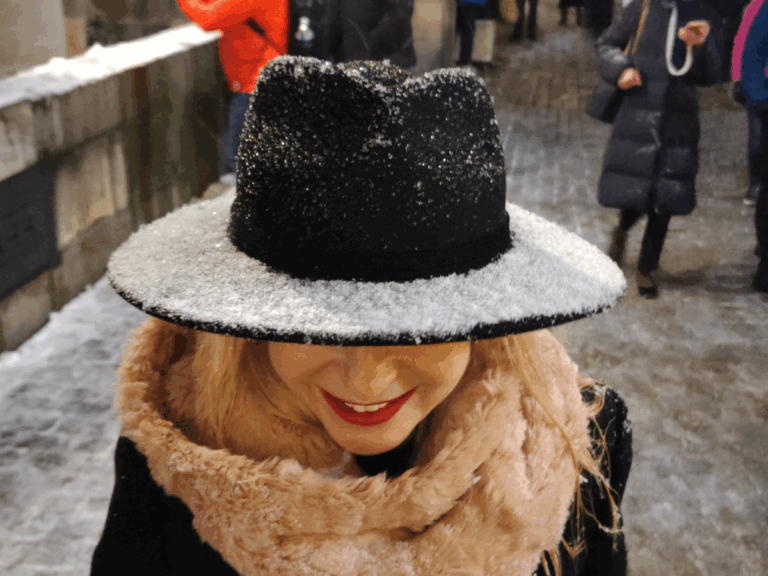 A magical winter moment on Prague’s Charles Bridge — a guided tour made unforgettable by fresh snowfall.